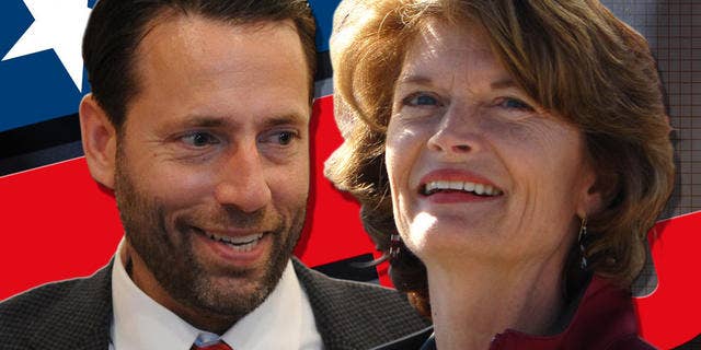 Republican candidate for U.S. Senate Joe Miller, center, smiles as he visits with supporters in Anchorage, Alaska Tuesday Aug. 24, 2010. ( AP Photo/Michael Dinneen)