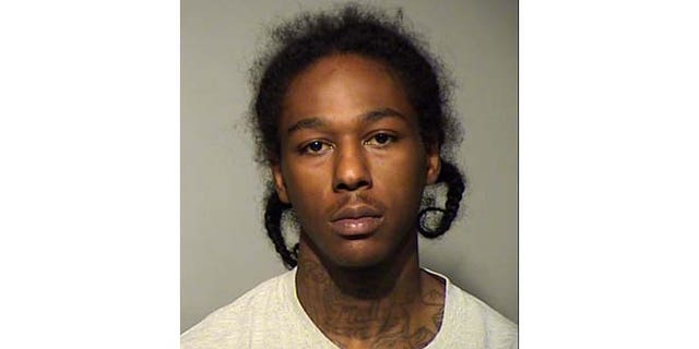 Sylville K. Smith was allegedly holding a stolen gun when he was shot by a police officer.