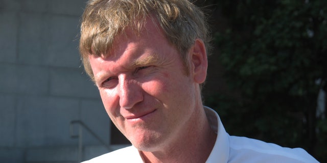 Aug. 26, 2014: Republican gubernatorial hopeful Scott Milne stands outside a polling place on primary election day.