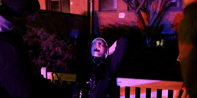 A protester waits for treatment after being pepper sprayed by police at the University of Washington where protesters arrived outside a speaking engagement by Breitbart News editor Milo Yiannopoulosin in Seattle, Washington, U.S. January 20, 2017. REUTERS/Jason Redmond - RTSWMMB