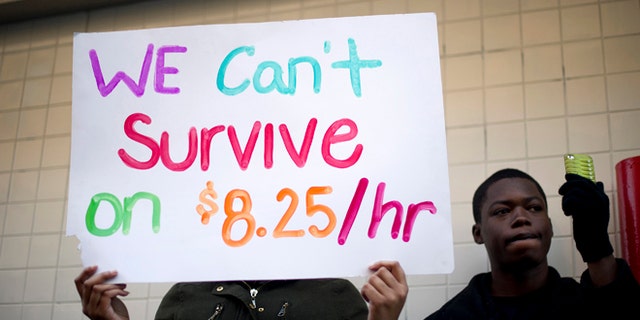 Dec. 5, 2013: Protesters calling for higher wages for fast-food workers outside a McDonald's in Oakland, Calif.