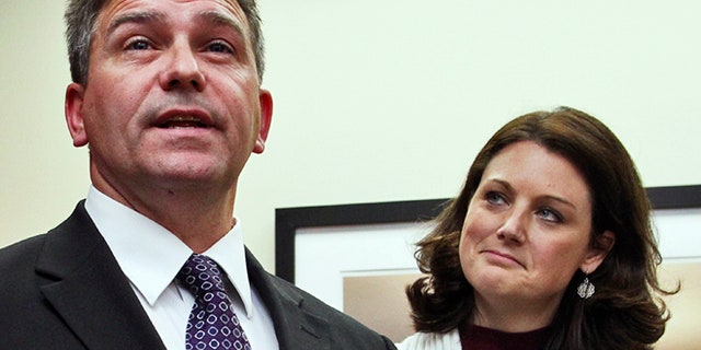 Nov. 30, 2012: In this file photo, Todd Hoffner talks with reporters with his wife, Melodee, in Mankato, Minn., after a judge dismissed child pornography charges against him.
