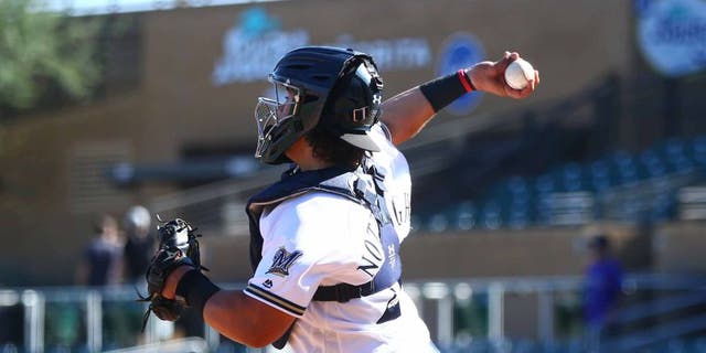 Nov 2, 2016; Scottsdale, AZ, USA; Salt River Rafters catcher Jacob Nottingham of the Milwaukee Brewers against the Scottsdale Scorpions during an Arizona Fall League game at Salt River Fields at Talking Stick. Mandatory Credit: Mark J. Rebilas-USA TODAY Sports