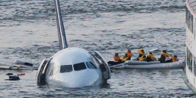 Passengers in an inflatable raft after Airbus 320 US Airways jet landed in the Hudson River in New York in 2009.
