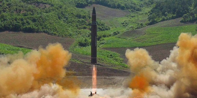 This photo distributed by the North Korean government shows what was said to be the launch of a Hwasong-14 intercontinental ballistic missile, ICBM, in North Korea's northwest, Tuesday, July 4, 2017. Independent journalists were not given access to cover the event depicted in this photo. North Korea claimed to have tested its first intercontinental ballistic missile in a launch Tuesday, a potential game-changing development in its push to militarily challenge Washington â but a declaration that conflicts with earlier South Korean and U.S. assessments that it had an intermediate range. (Korean Central News Agency/Korea News Service via AP)