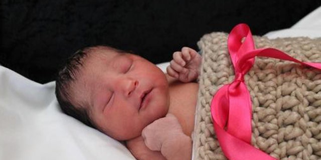 CORRECTS SPELLING OF FIRST NAME FROM SOFIA TO SOPHIA - This photo provided by the Wichita Police shows Sophia Victoria Gonzalez Abarca, a missing week-old baby in Wichita, Kan.  Police in Kansas say the week-old newborn girl who went missing after her mother was shot to death has been found alive in Dallas. Chief Gordon Ramsay said Saturday, Nov. 19, 2016 that suspects in the death of 27-year-old Laura Abarca-Nogueda took the child and fled to Texas, where Sophia Victoria Gonzalez Abarca was found safe. Ramsay said two people are in custody.   (Wichita Police via AP)