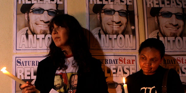 May 3: Journalists hold candles during the vigil for photojournalist Anton Hammerl calling for his release on the World Press Freedom Day in Johannesburg, South Africa. Hammerl was captured in Libya four weeks ago (5 April).