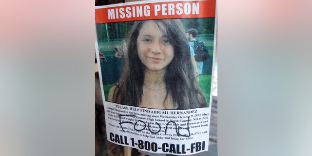 July 22, 2014: In this file photo of a missing person poster of Abigail Hernandez displayed in a storefront window in North Conway, N.H., shows Hernandez has been found.