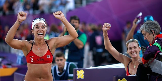 Olympic gold-medal winning volleyball star Misty May-Treanor, left, was also reportedly appointed to President Trumps' sports council.