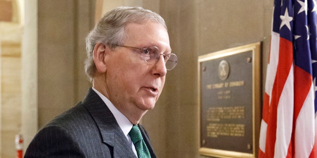 Monday, Jan. 5, 2015 photo of incoming Senate Majority Leader Mitch McConnell of Ky. outside his office on Capitol Hill in Washington.