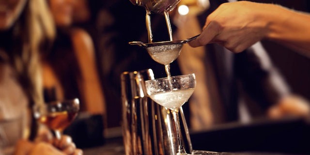 Bartender Serving Cocktail Drinks