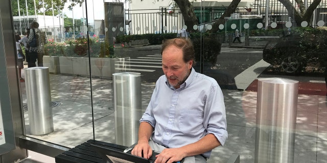Matthew Lee has been filing stories from a bus stop outside the U.N.