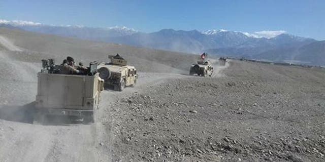 Afghan forces near the MOAB site.