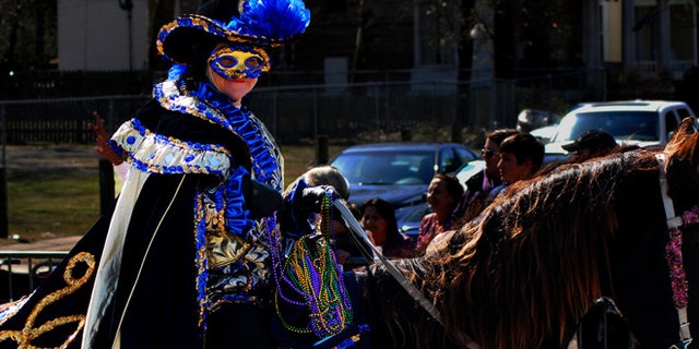One of the 1.3 million people take part in Mobile's Carnival festivities.