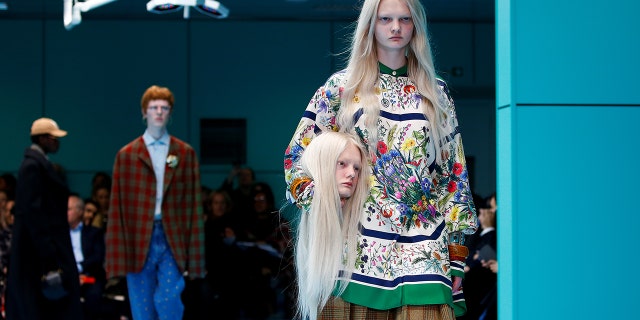 Designer Alessandro Michele sent models down the catwalk toting decapitated mannequin heads, designed to look just like the models’ own