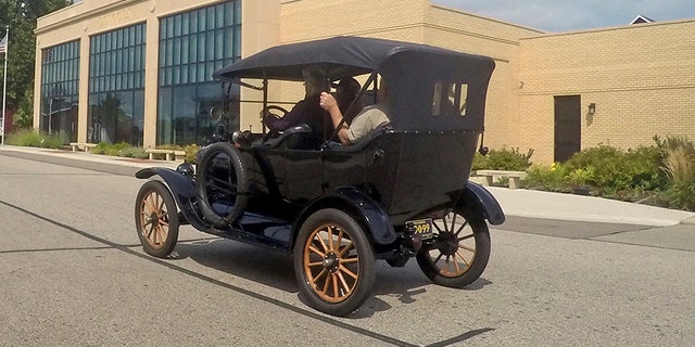 In this Aug. 31, 2017 photo, a student driver operates a Model T on the grounds of the Gilmore Car Museum in Hickory Corners, Mich. More than 500 people this year learned how to drive the historic Ford car at a one-day, four-hour course offered by the museum near Kalamazoo. (AP Photo/Mike Householder)