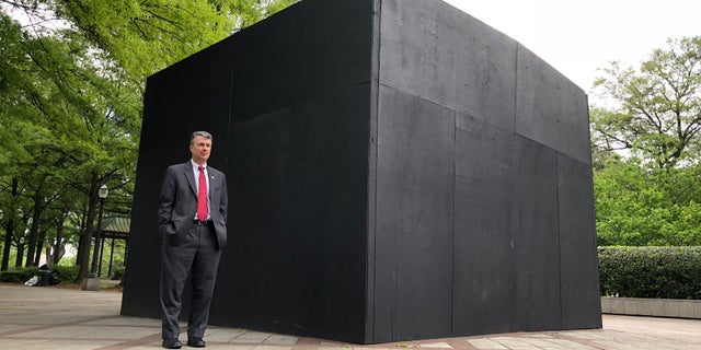 Alabama's Attorney General Steve Marshall visits the Confederate monument for the first time since the wall was constructed.