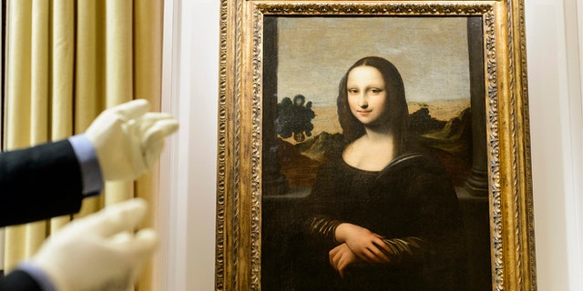 Sept. 26, 2012: A painting attributed to Leonardo da Vinci and representing Mona Lisa is seen during a preview presentation in a vault in Onex near Geneva.