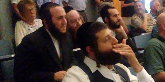 Residents of the Hasidic village of Kiryas Joel at a hearing in Orange County, New York about a plan to let them annex land from the town of Monroe and form their own town