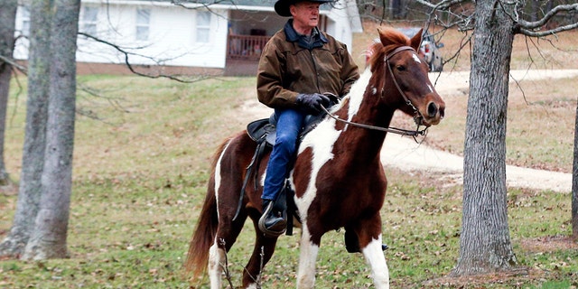 Alabama Republican Senate candidate Roy Moore rode in on his horse, as he traditionally does, to cast his ballot.
