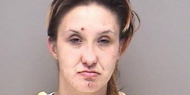 Heather Moore, 28, faces eight charges, including motor vehicle theft and fugitive from justice.