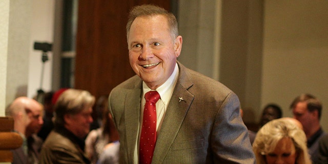 Republican candidate Roy Moore enters the stage to make his victory speech after defeating incumbent Luther Strange to his supporters at the RSA Activity center in Montgomery, Alabama, U.S. September 26, 2017, during the runoff election for the Republican nomination for Alabama's U.S. Senate seat vacated by Attorney General Jeff Sessions.