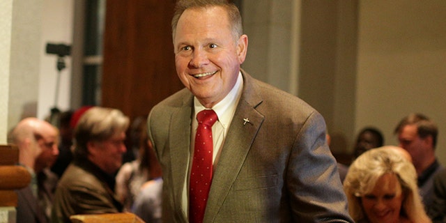 Republican candidate Roy Moore enters the stage to make his victory speech after defeating incumbent Luther Strange to his supporters at the RSA Activity center in Montgomery, Alabama, U.S. September 26, 2017, during the runoff election for the Republican nomination for Alabama's U.S. Senate seat vacated by Attorney General Jeff Sessions.