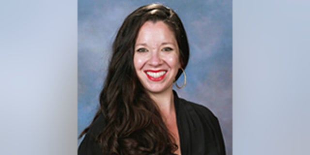 Alix Morales, a Spanish teacher at Siegel High School, was suspended without pay after being accused of selling alcohol to students.