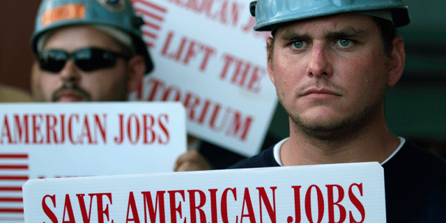 In this June 24, 2010 file photo, oil workers from the Gulf Island Fabrication Yard listen to Louisiana Gov. Bobby Jindal during a speech in Houma, La., where he spoke out against the six-month moratorium on deepwater drilling, saying it would kill thousands of Louisiana jobs. (AP)