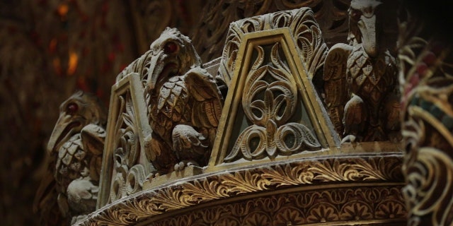 Intricate gold finishes adorn the walls and ceilings of the Loews 175th Street Theatre.