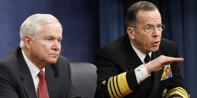 March 1, 2011: Defense Secretary Robert Gates, left, and Joint Chiefs Chairman Adm. Mike Mullen take part in a news conference at the Pentagon.
