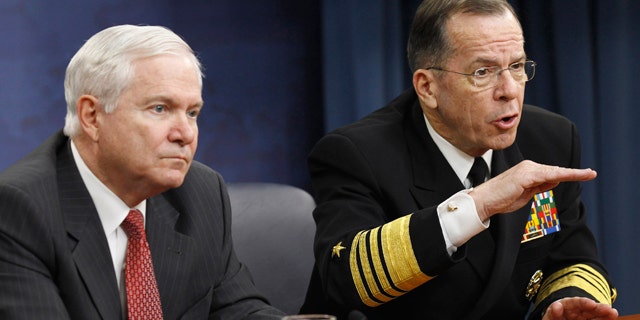 March 1, 2011: Defense Secretary Robert Gates, left, and Joint Chiefs Chairman Adm. Mike Mullen take part in a news conference at the Pentagon.
