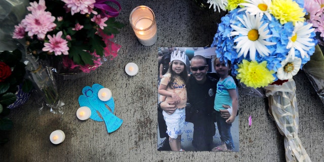 A photo of Moreno at a memorial outside the Kent Police Station.
