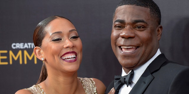 Morgan and wife actress Megan Wollover arrive at the Creative Arts Emmys