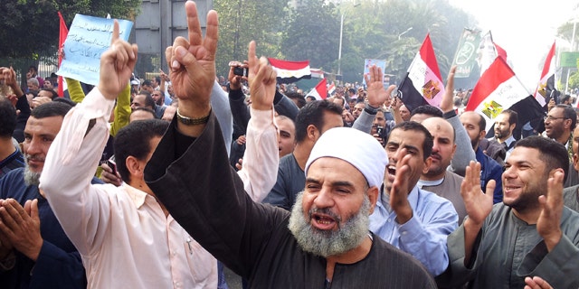 Supporters of Egyptian President Mohammed Morsi march in Cairo, Egypt.