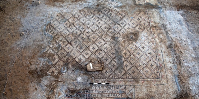 The mosaic and the inscription. (Photo: Sasha Flit, Tel Aviv University)