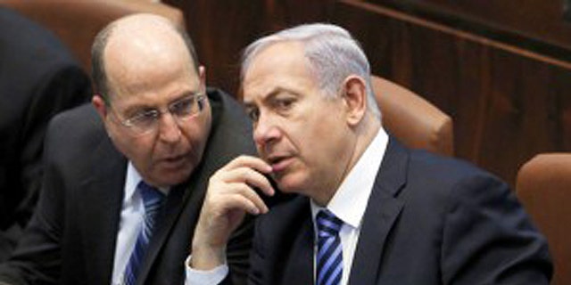 What do they really think? Israeli Defense Minister Moshe Ya’alon, (l.), shown here with Prime Minister Benjamin Netanyahu, blasted U.S. Secretary of State John Kerry in what were supposedly "private comments." (Reuters)