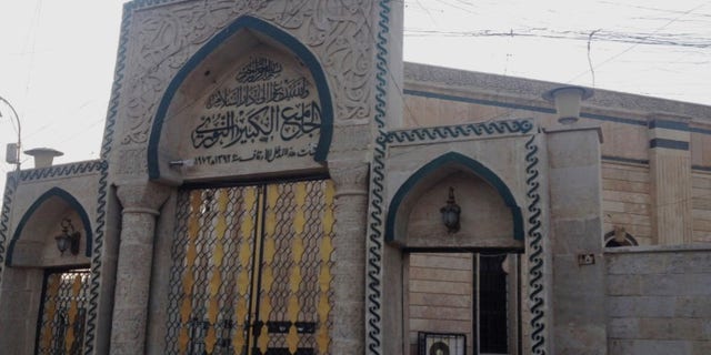 In this 2014 file photo, the gate of the Great Mosque or al-Nuri Mosque is seen in the northern city of Mosul, Iraq. The Islamic State group destroyed Mosul’s al-Nuri mosque and its iconic leaning minaret late Wednesday night when fighters detonated explosives inside the structures, according to Iraq’s Ministry of Defense.