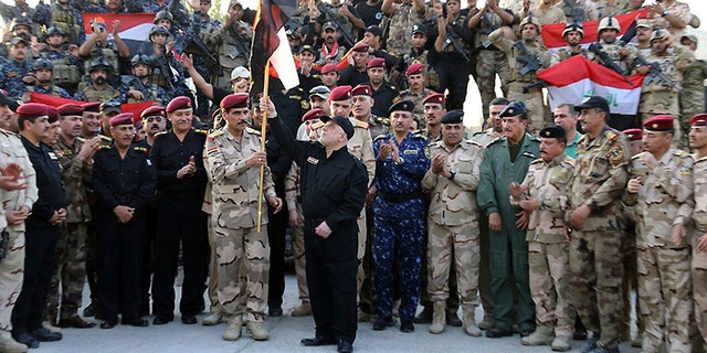 July 10, 2017: Iraq's prime minister Haider al-Abadi addresses forces from a small base on the edge of Mosul's Old City, where heavy clashes have been underway for days.