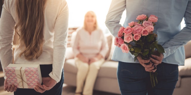 These young women purchased their Mother's Day gifts just seconds ago.