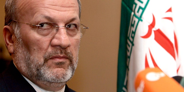 Feb. 20, 2006: Iran's Foreign Minister Manouchehr Mottaki listens to questions from journalists during a media conference at the Iranian Embassy in Brussels. Iranian President Mahmoud Ahmadinejad fired his foreign minister Monday as he was in the middle of an official visit to Africa and named the nuclear chief to serve as the country's acting top diplomat. (AP)