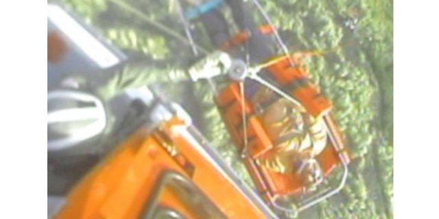 Dec. 17, 2013: Coast Guard Air Station Borinquen MH-65 Dolphin helicopter crew members hoist a 60-year-old man, who reportedly sustained multiple injuries after falling over 100-feet from a mountain in Yauco, Puerto Rico.