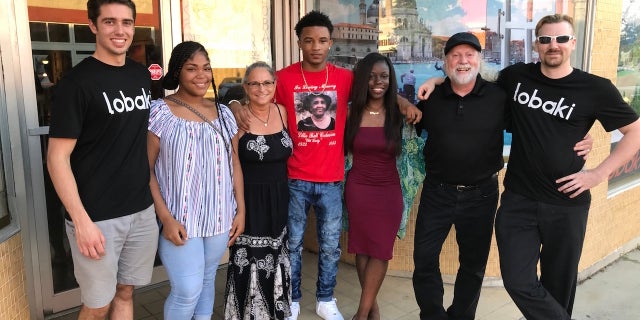 Members of the Lobaki Inc. team pose for a photo outside their office in downtown Clarksdale, Miss. (Left to right) Michael Bezzina, Mya Calhoun, Wendy Farley, Deuntay Williams, Shalin Jewett, Vince Jordan and Vinny Jordan.