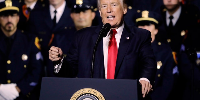President Donald Trump speaks to law enforcement officials on the street gang MS-13, Friday, July 28, 2017, in Brentwood, N.Y. (AP Photo/Frank Franklin II)