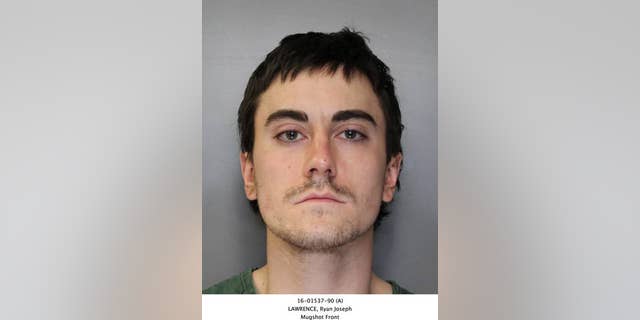 This booking photo provided by the Syracuse, N.Y., Police Department shows Ryan Lawrence, who is charged in the death of his 21-month-old daughter Maddox Lawrence.