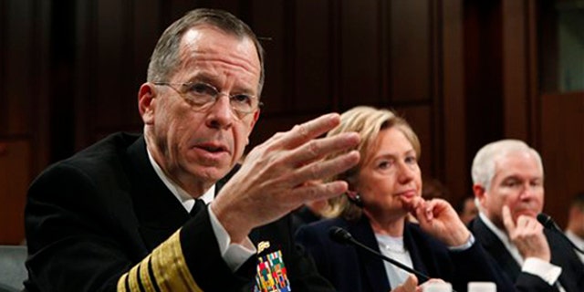 Joint Chiefs Chairman Adm. Michael Mullen, left, testifies on Capitol Hill Dec. 3, as Secretary of State Hillary Clinton and Defense Secretary Robert Gates look on. (AP Photo)