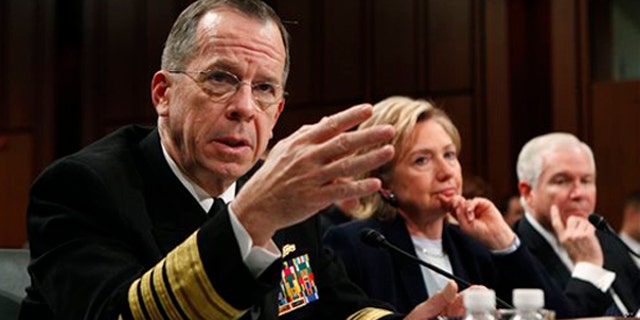 Joint Chiefs Chairman Adm. Michael Mullen, left, testifies on Capitol Hill Dec. 3, as Secretary of State Hillary Clinton and Defense Secretary Robert Gates look on. (AP Photo)