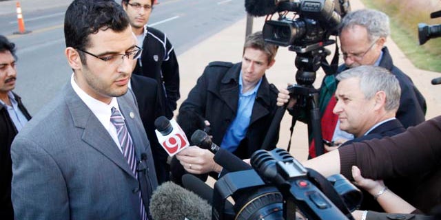 Nov. 8: Muneer Awad, executive director of Council on American-Islamic Relations in Oklahoma, talks to members of the media outside a Federal Courthouse in Oklahoma City. A federal judge in Oklahoma will decide whether to block a constitutional amendment that prohibits state courts from considering international or Islamic law when deciding cases.