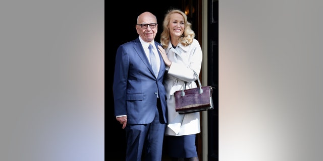 News Corp Executive Chairman Rupert Murdoch and Jerry Hall leave Spencer House, London, after getting married, Friday March 4, 2016. (Yui Mok/PA via AP) UNITED KINGDOM OUT NO SALES NO ARCHIVE