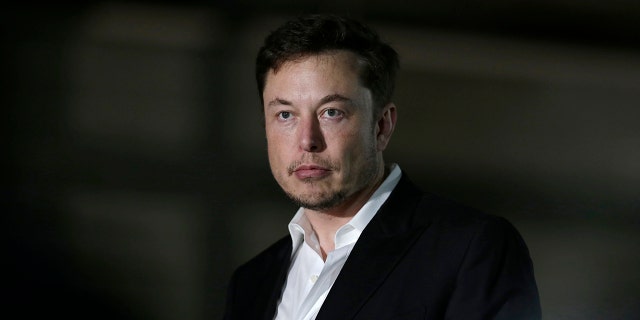 FILE- In this June 14, 2018, file photo, Tesla CEO and founder of the Boring Company Elon Musk speaks at a news conference in Chicago. Tesla is suing a former employee at its Nevada battery factory alleging that he hacked into the manufacturing computers and disclosed confidential trade secrets. The federal lawsuit filed Wednesday, June 20, contends that Martin Tripp of Sparks, Nev., also made false claims to the media about information he stole, including claims that the company used punctured battery cells in the Model 3 electric car. (AP Photo/Kiichiro Sato)